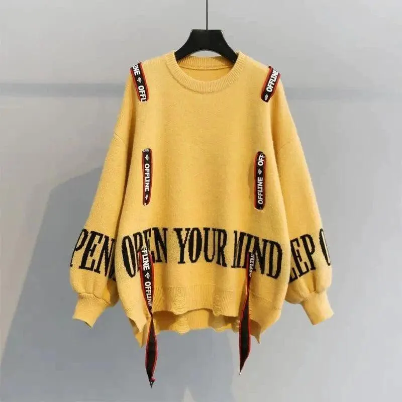 Turtleneck sweater letter holes
