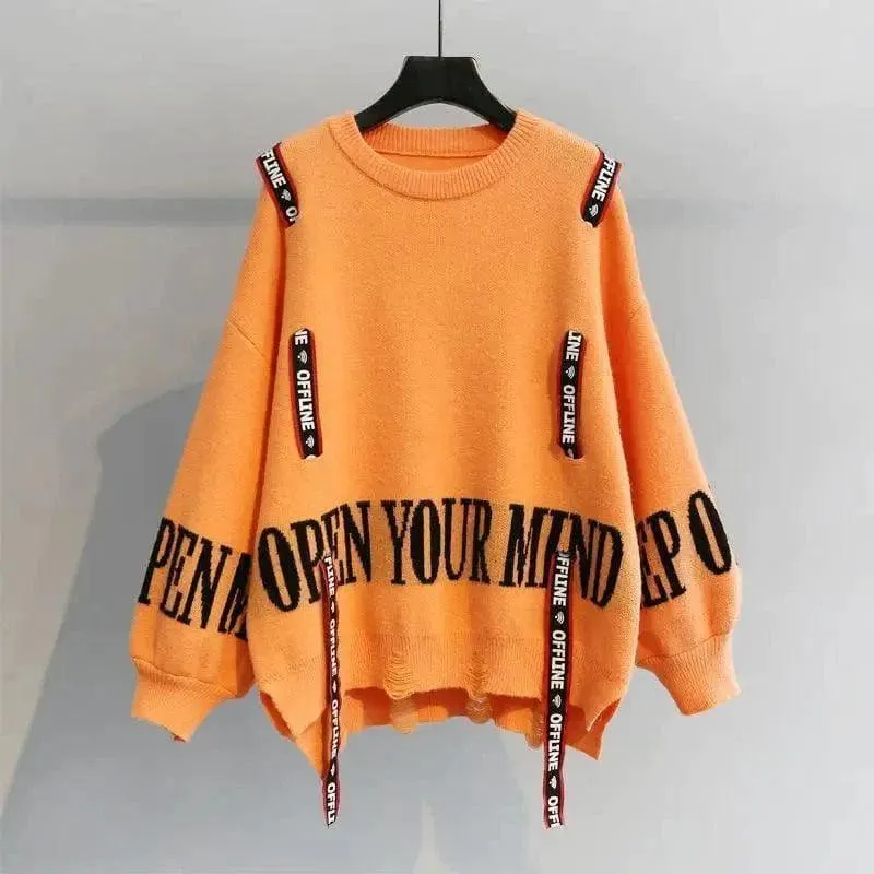 Turtleneck sweater letter holes